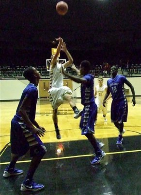 Image: Jase Holden(3) fades back for 2-points over Connally defenders.