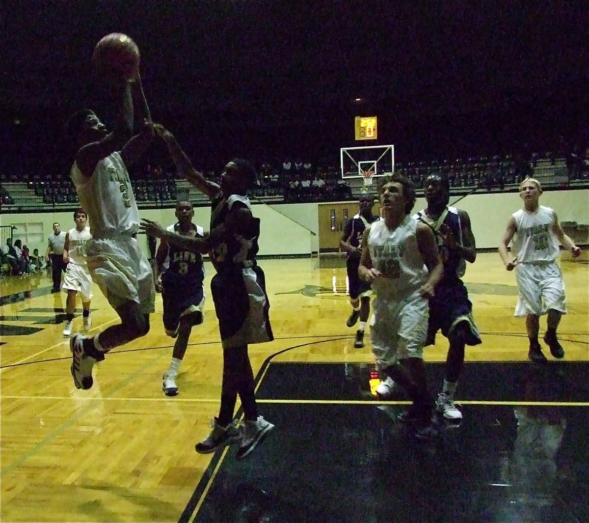 Image: Italy’s Eric Carson(2) attacks along the baseline against the Lions during the JV game.