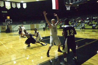 Image: JV Gladiators Cody Boyd(10) and Eric Carson(2) defend the inbound pass.