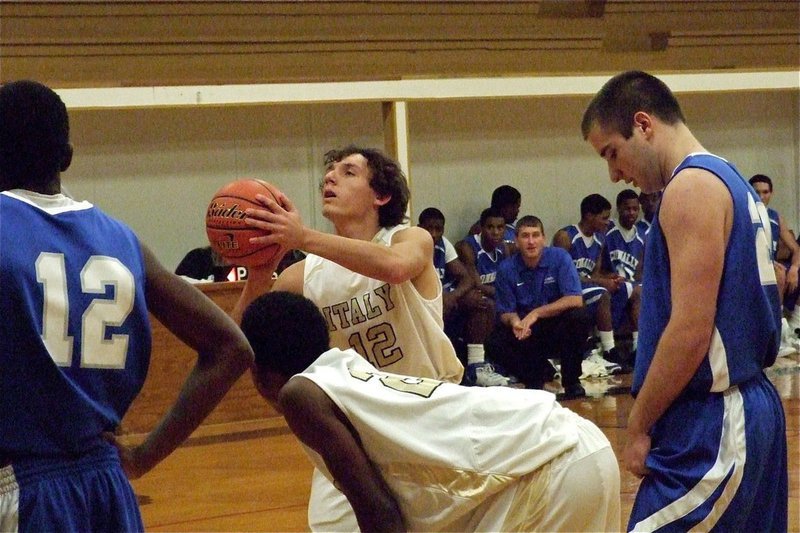 Image: JV Gladiator Chace McGinnis(12) puts in a free throw against Connally.