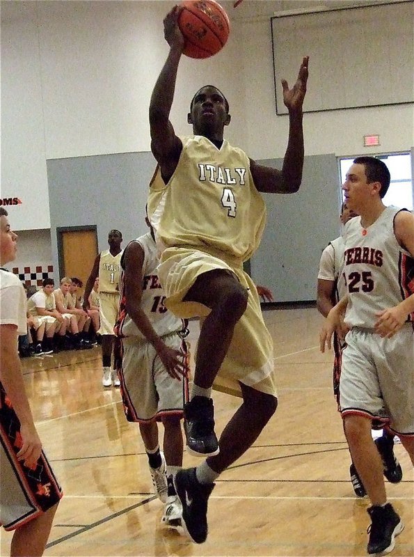 Image: On the move, Tyvion Copeland(4) takes it to the rim.