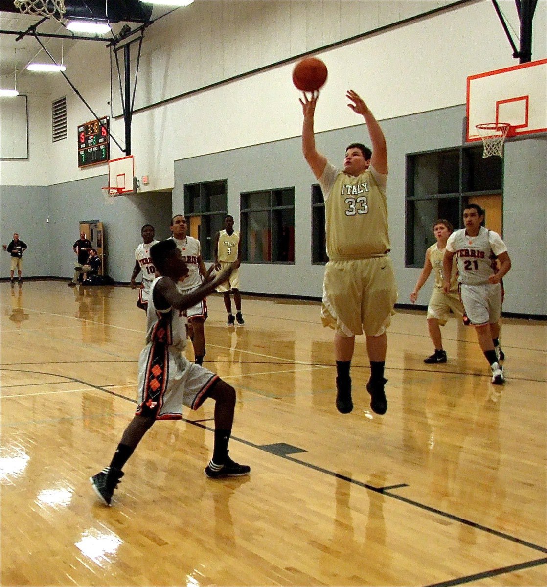 Image: John Byers(33) puts up a jumper against Ferris.