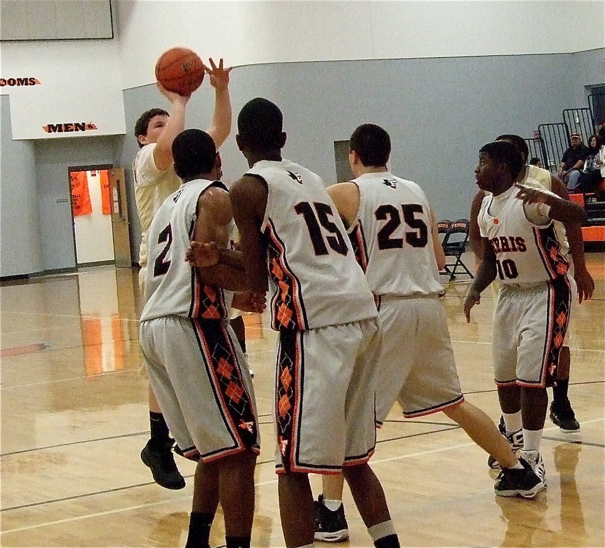 Image: John Byers(33) turns and hits over a swarm of Yellow Jackets.