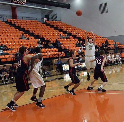 Image: Italy’s John Byers(33) knocks down a 3-pointer. Byers went 3-of-3 in the Championship game against Red Oak Life. 