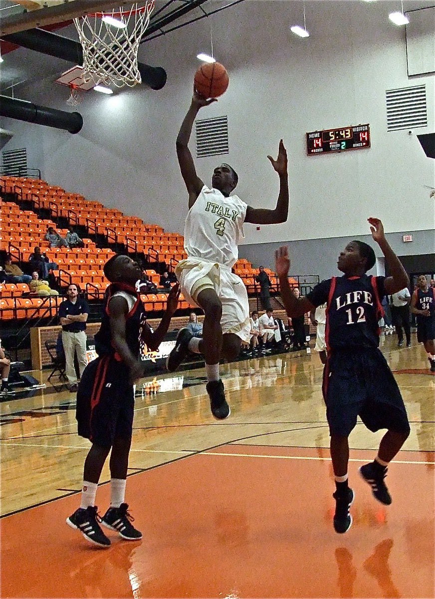 Image: Tyvion Copeland(4) splits two Mustang defenders.