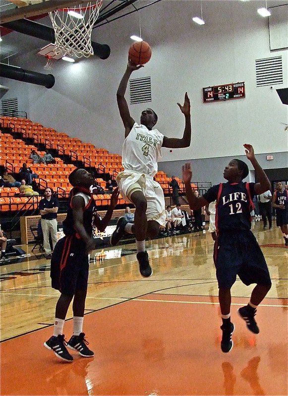 Image: Tyvion Copeland(4) splits two Mustang defenders.