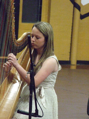 Image: Maddie Pittmon thrills the audience with her harp offerings.
