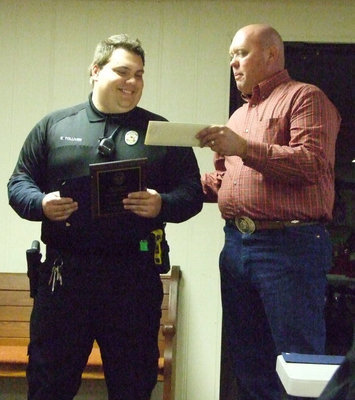 Image: Eric Tolliver received Officer of the Year for 2011.
