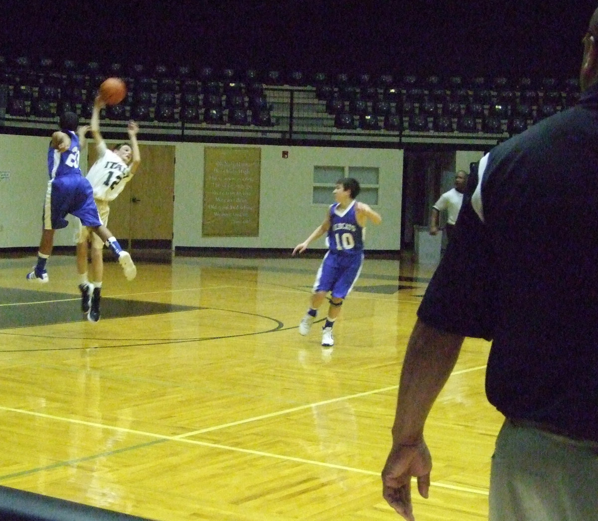 Image: Ty Windham(#12) grabs the ball from this Wildcat.