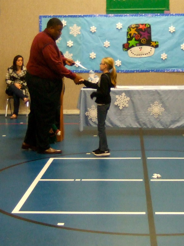 Image: Madelyn Chambers (fourth grader) happy to receive her awards.