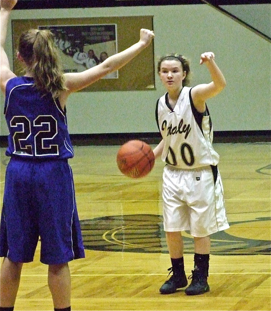 Image: JV Lady Gladiator Tara Wallis(00) calls an offensive play against Whitney.