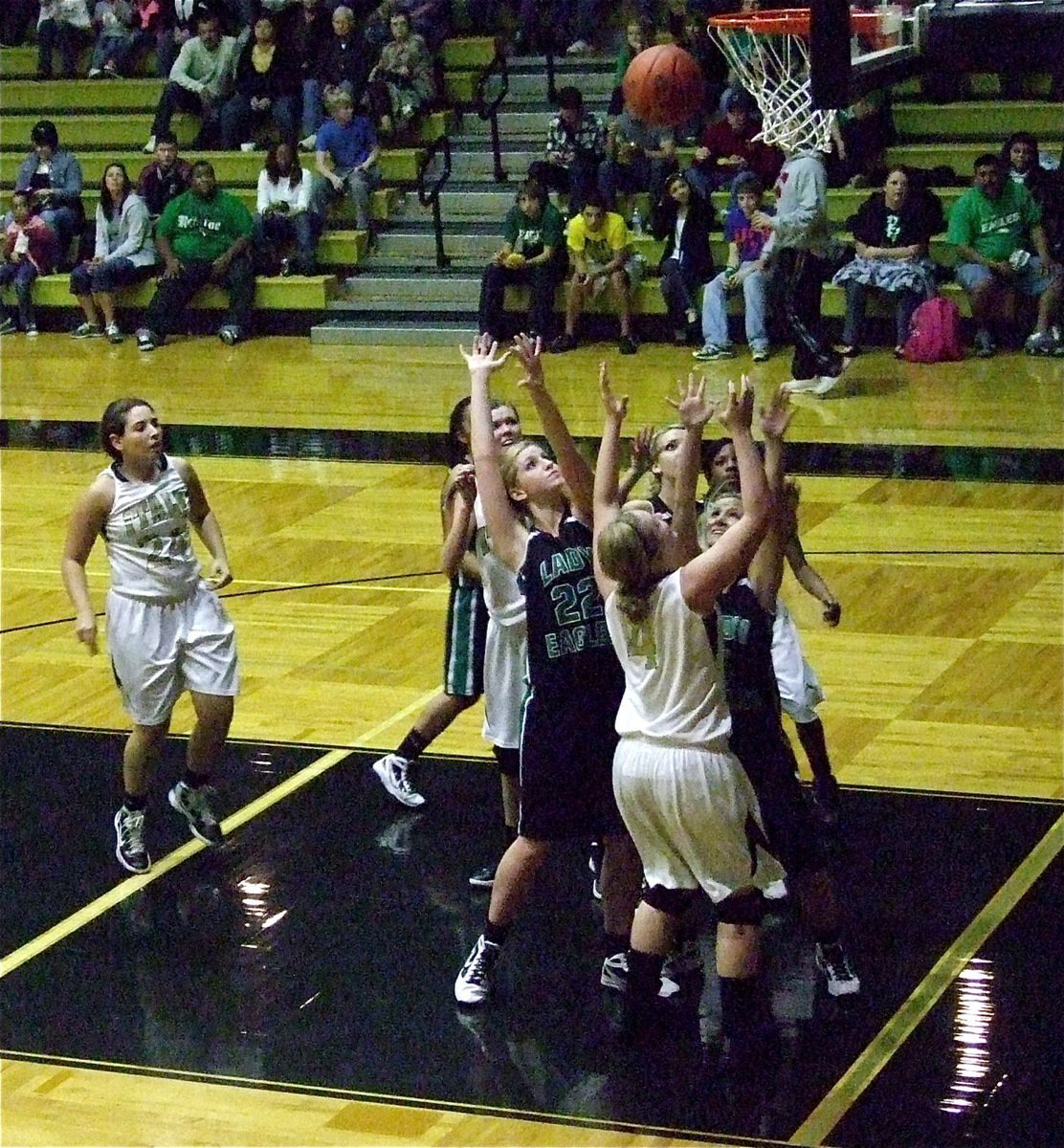 Image: Lady Gladiator Jaclynn Lewis(4) has a shot at the rebound.