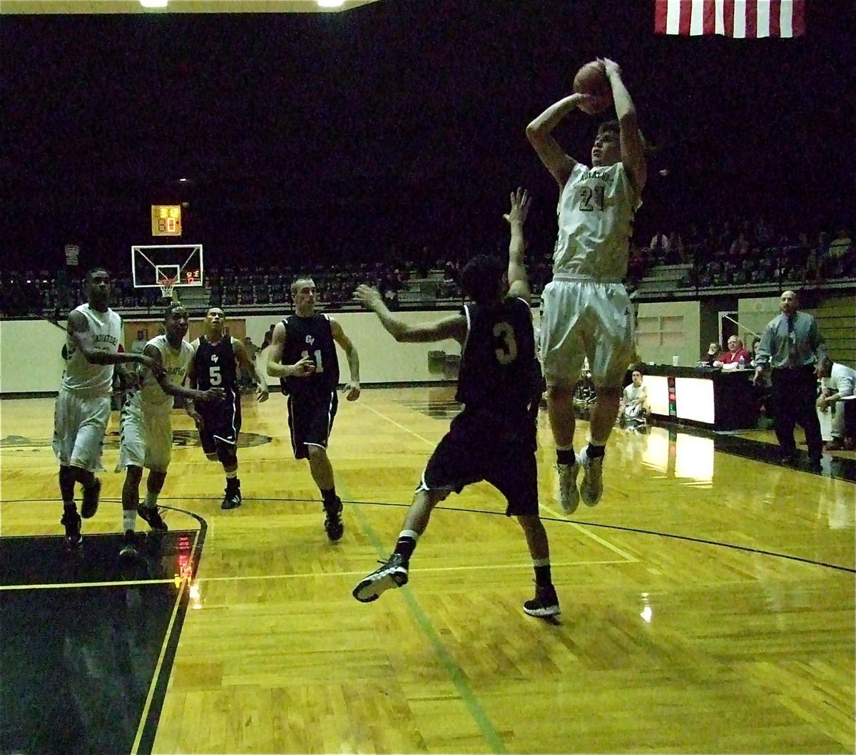 Image: Cole Hopkins(21) rises over a Zebra defender.