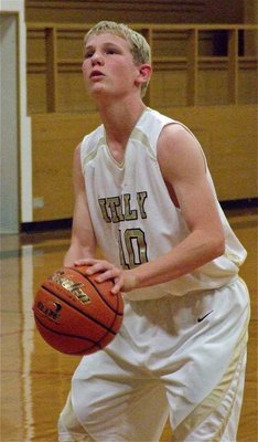 Image: JV Gladiator Cody Boyd(10) puts in a free throw against Rio Vista.