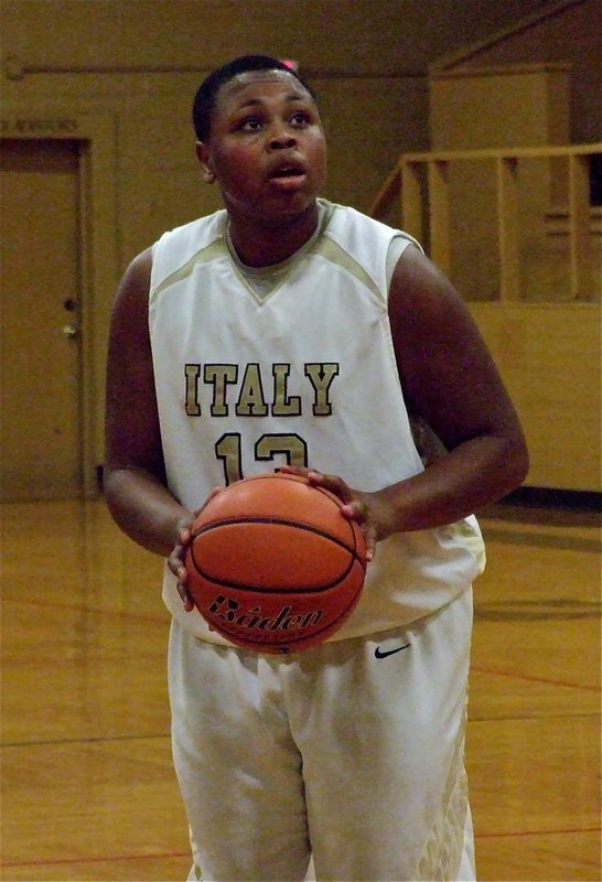 Image: Darol Mayberry(13) puts in a free throw for the JV Gladiators.