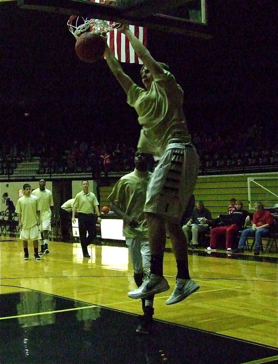 Image: Cole Hopkins slams one in during warmups before the Gladiator game against Maypearl.