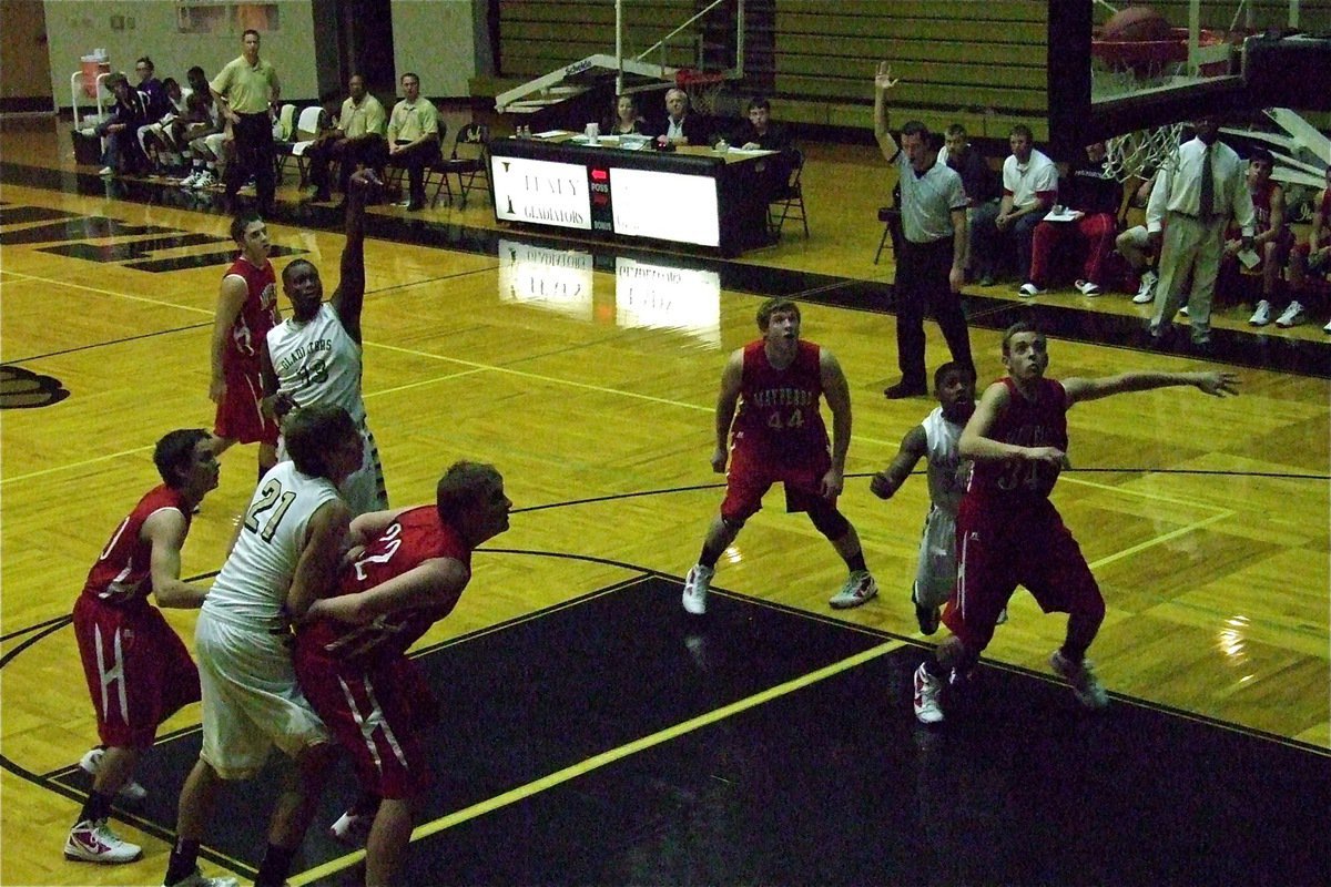 Image: Gladiator Larry Mayberry(13) knocks down a free throw against the Panthers. 