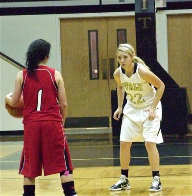 Image: Lady Gladiator Megan Richards(22) tries to corral an Axtell ball handler.