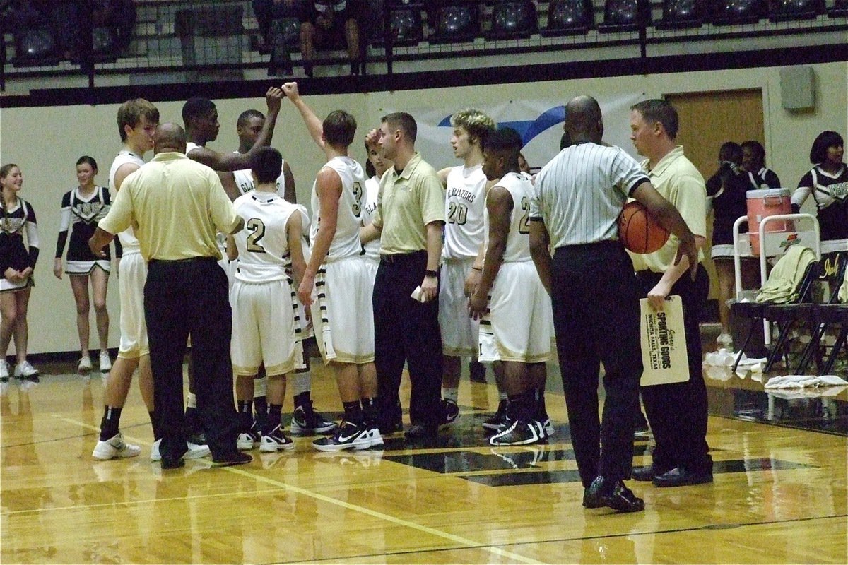 Image: Gladiator coaches Larry Mayberry, Sr., Aidan Callahan and Josh Ward are active during a timeout call.