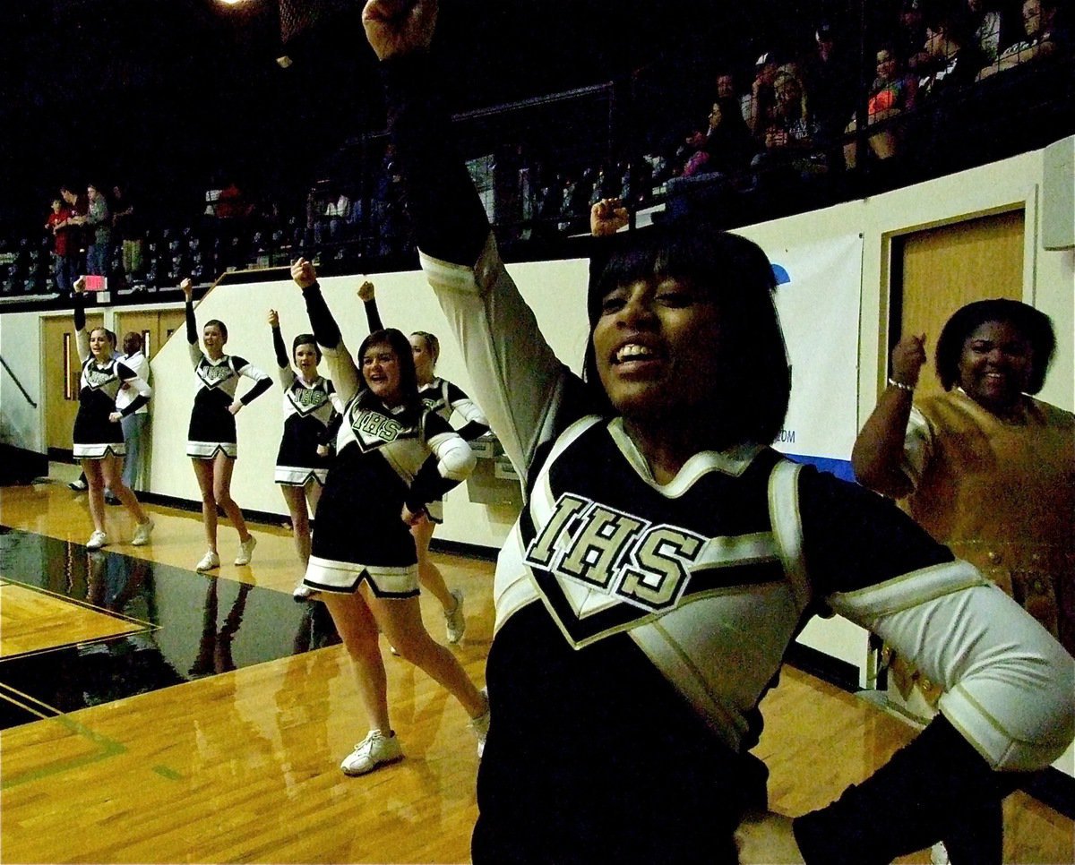 Image: Lady Gladiator cheerleader Ashley Harper leads the charge against the Axtell Longhorns.