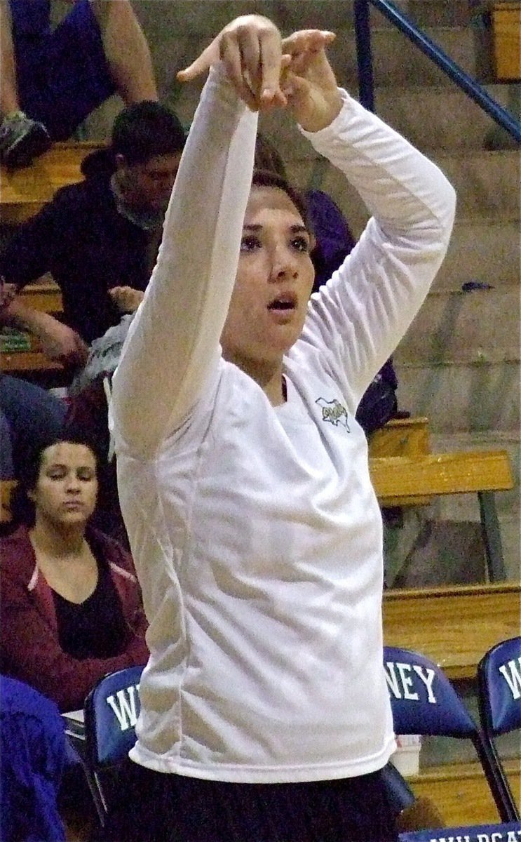 Image: Lady Gladiator Alyssa Richards practices a baseline shot before her team’s game against Whitney.