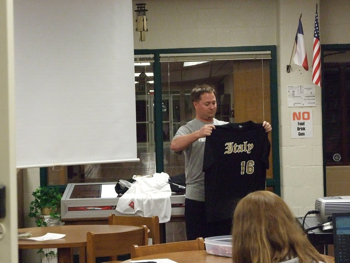 Image: Head Coach Josh Ward showed off the new varsity team jersey.