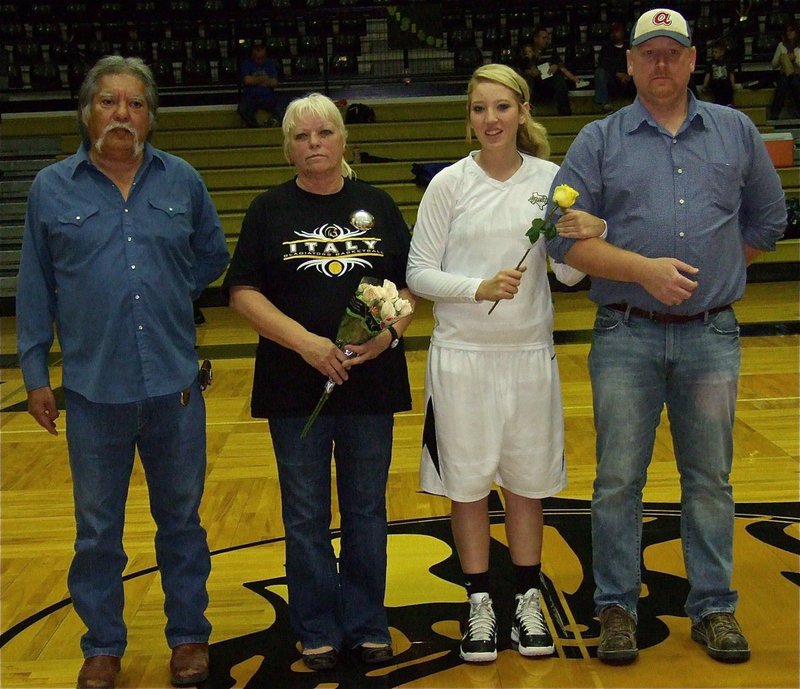 Image: Lady Gladiator Megan Richards is honored during senior night inside Italy Coliseum.