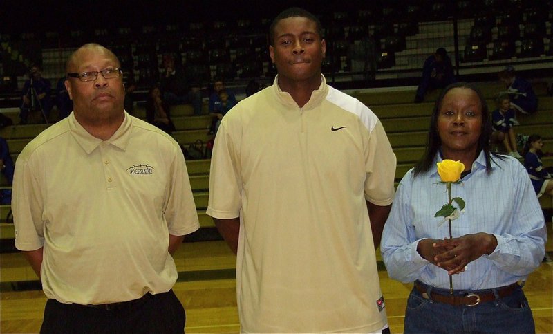 Image: Gladiator Larry Mayberry, Jr. is honored during senior night inside Italy Coliseum.