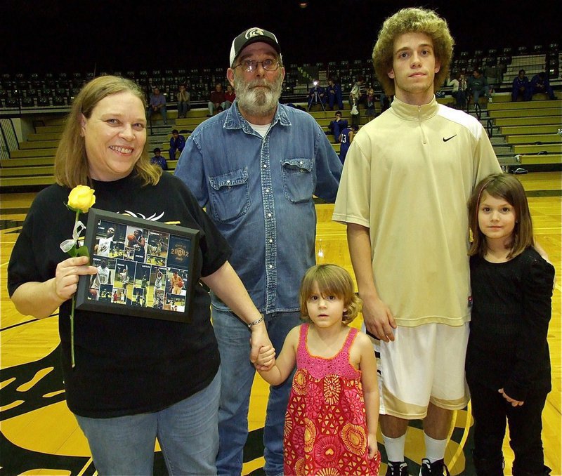 Image: Gladiator Brandon Souder is honored during senior night inside Italy Coliseum.