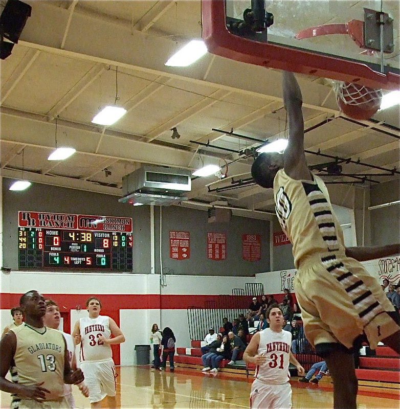 Image: Devonta Simmons(10) dunks on the Panthers to get Italy off to an early 10-0 lead during the first-quarter.