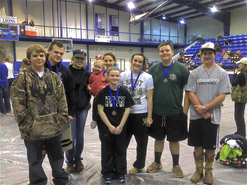 Image: Italy Powerlifting Team members competing in Blooming Grove were Tyler Crawley, Chase “Ham-Bone” Hamilton, Alyssa “Bone Crusher” Richards, Tara Wallis, Kaytlyn Bales, Kelton Bales and Kyle Fortenberry. Also pictured Acee Richters and coach Heather Richters (far right of the shot).