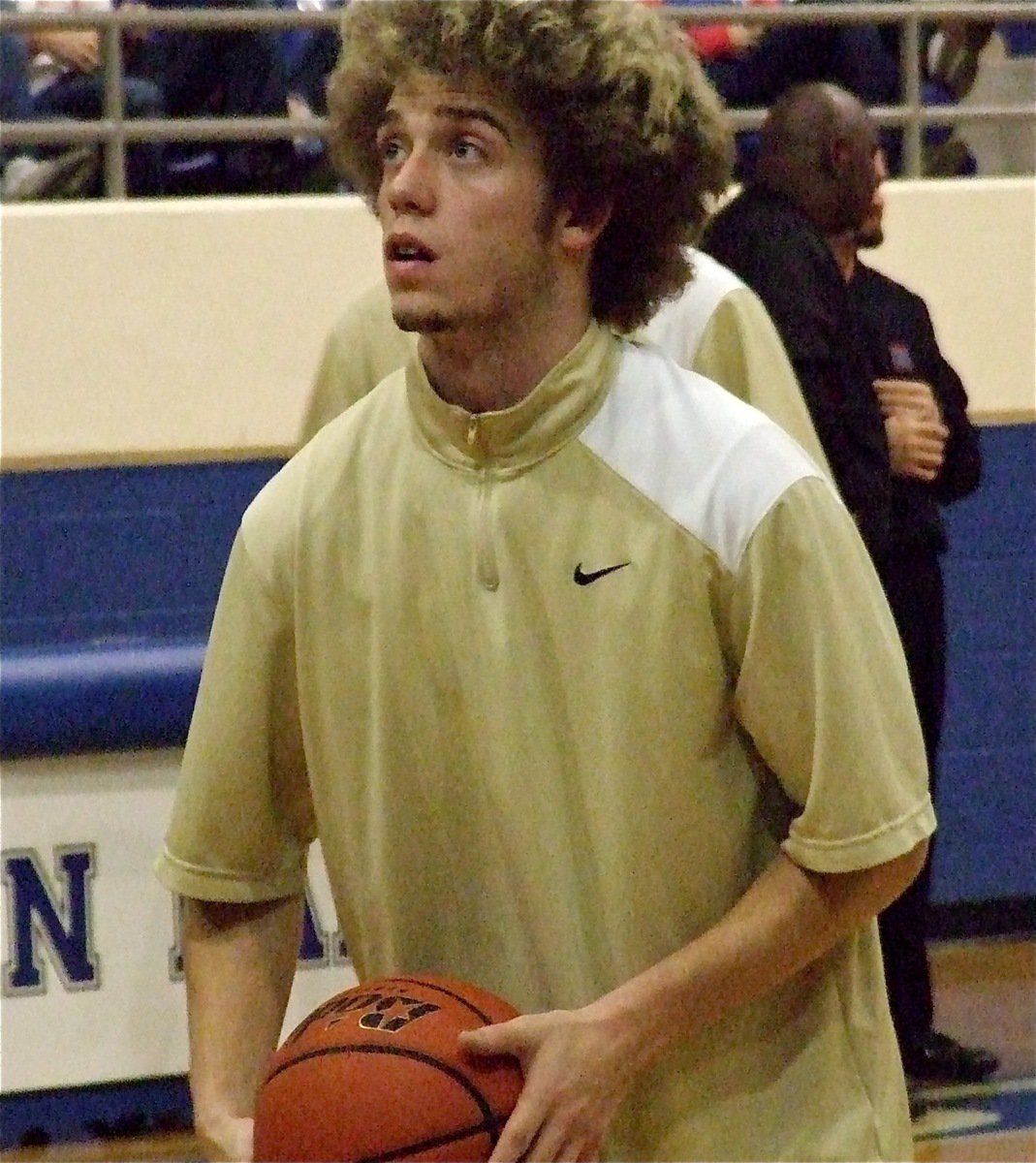 Image: Gladiator senior Brandon Souder concentrates during his pre-game free-throws as co-district champions, Italy and Whitney, battle for playoff seeding.