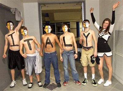 Image: Rowdy Gladiator fans Ryan Connor(I), Levi McBride(T), Jorge Galvan(A), Brandon Connor(L) and Ty Windham(Y) show their shool spirit as IHS Lady Gladiator cheerleader Kaitlyn Rossa adds the exclamation point!