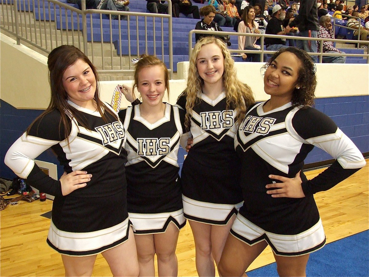 Image: IHS Lady Gladiator Cheerleaders Bailey DeBorde, Felicia Little, Kelsey Nelson and Destani Anderson take a moment to pose. 