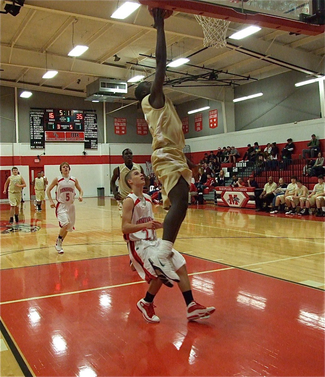 Image: Point guard Marvin Cox(1) helps to lead Italy’s JV Gladiators to a district championship.