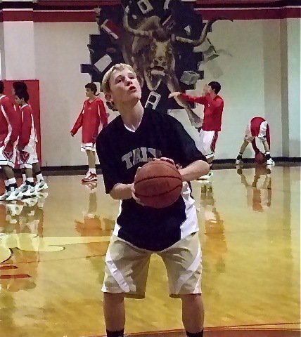 Image: Cody Boyd is all focus during a pre-game practice free-throw. 