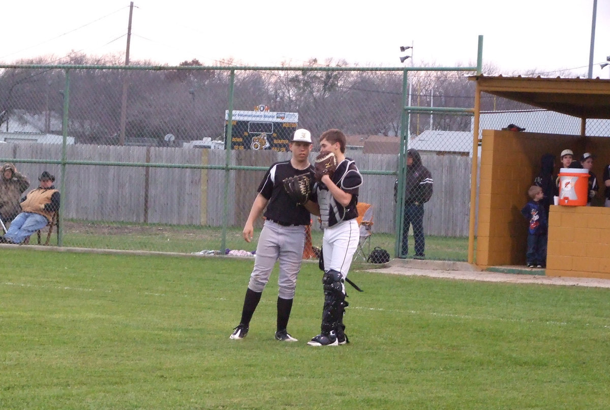 Image: Kyle Jackson and catcher, Ross Stiles, talk about the next play.