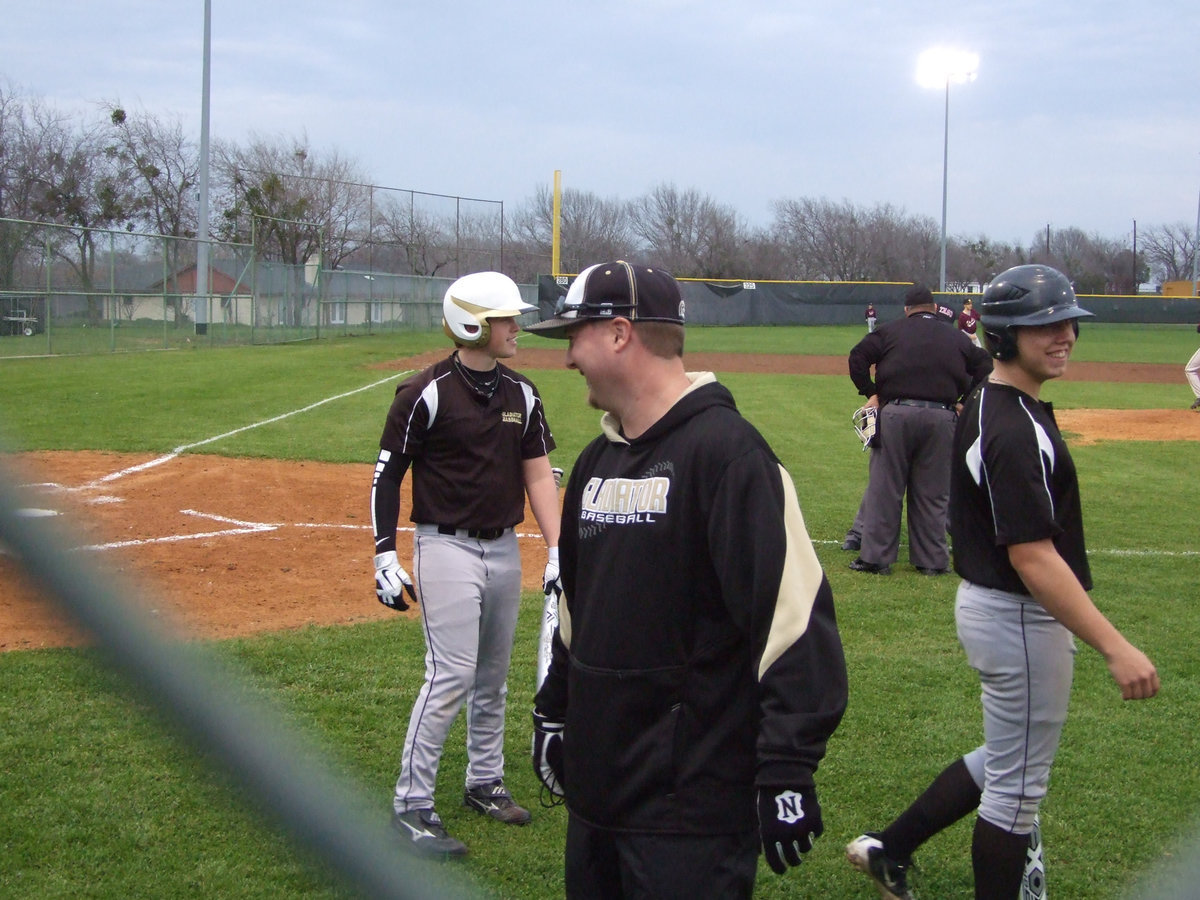 Image: Coach Josh Ward approves of his batting lineup.