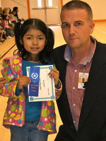 Image: Itzel Guerrero is in Pre-K and received an award for A Honor Roll.