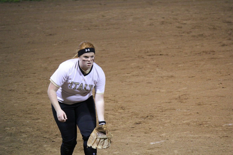 Image: Katie Byers moves in to cover a potential bunt.