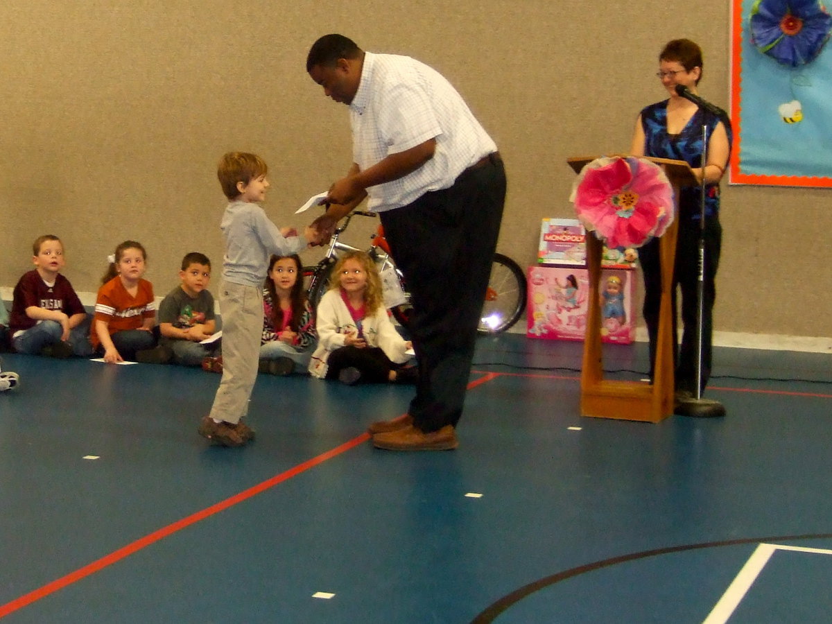 Image: Frankie South is so happy to receive his award he ran all the to Mr. Miller when his name was called!