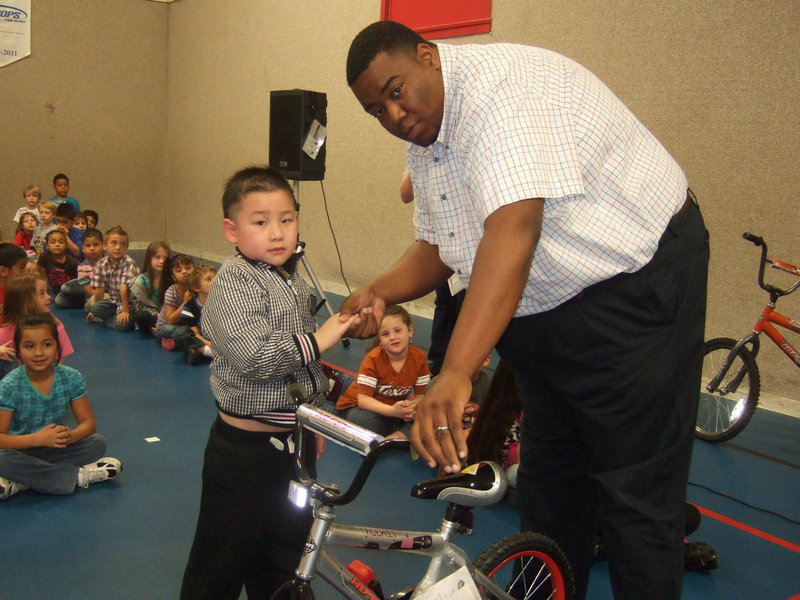 Image: Evan Chin was the winner for the boy’s bike for perfect attendance.