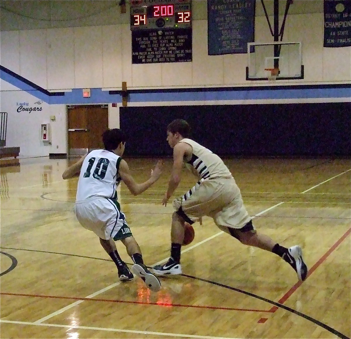 Image: Jase Holden(3) reverses the ball around a Lion defender.