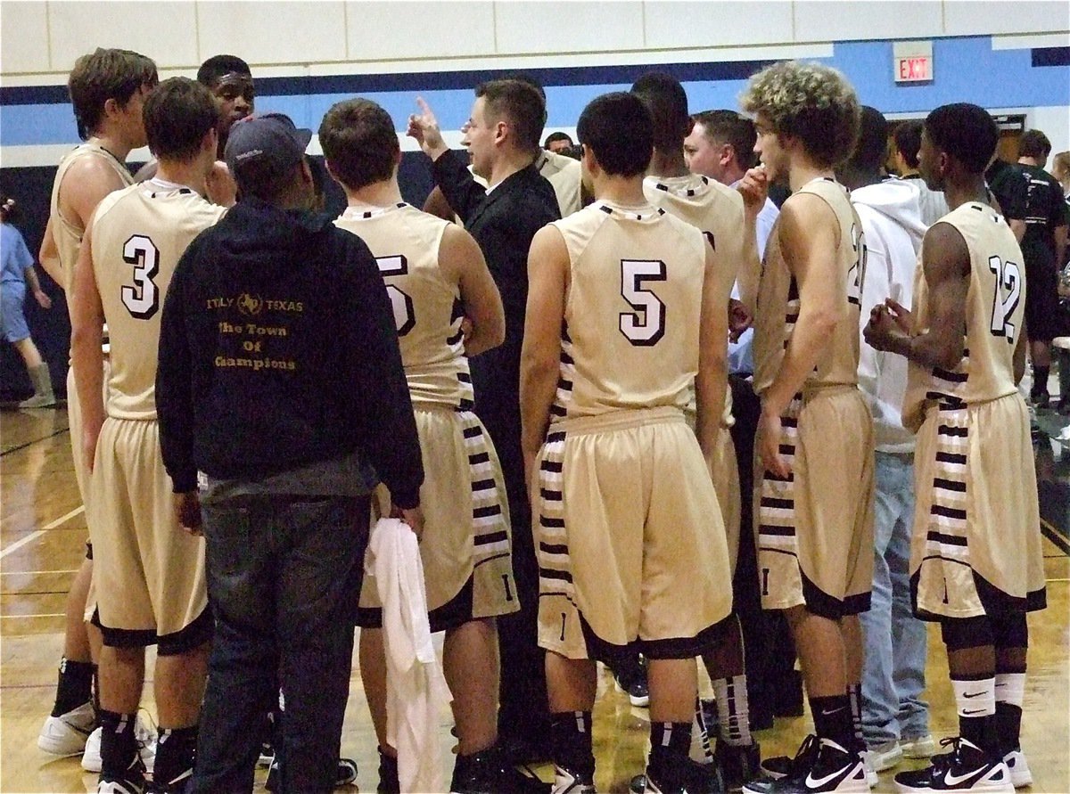 Image: The basketball game quickly turns into a chess match as Coach Callahan directs his Gladiators toward their next move.