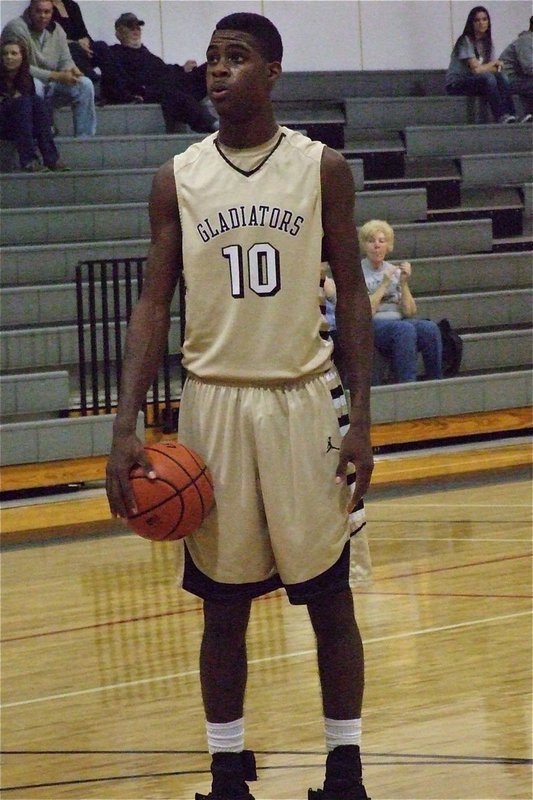 Image: Devonta Simmons takes his time after being fouled attempting a three-pointer.