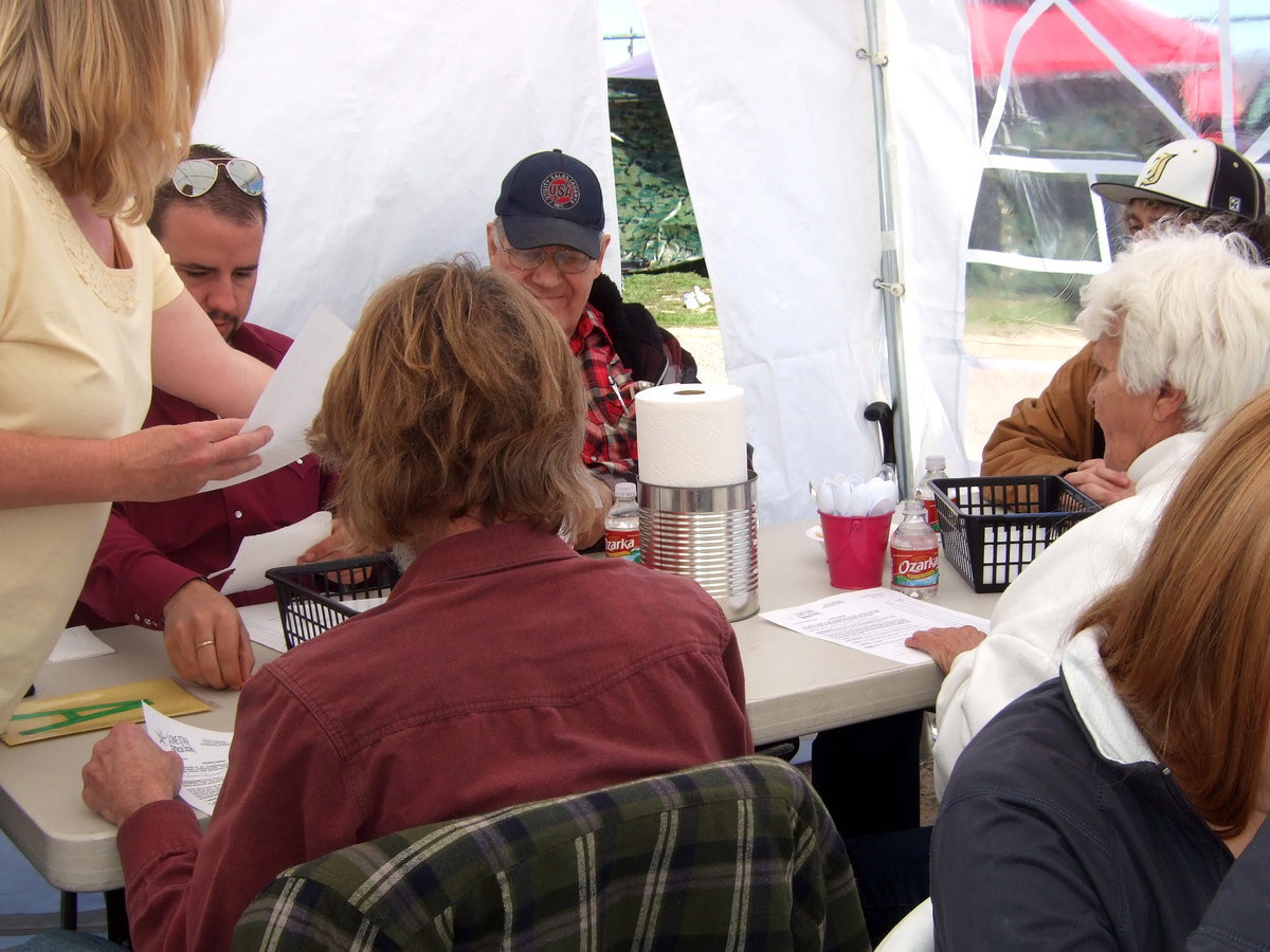 Image: Handing out the judging sheets.