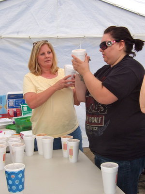 Image: Marking numbers on the bean containers for the judges to taste.