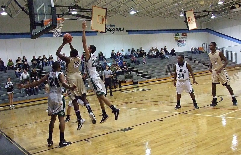 Image: Working the low block is Larry Mayberry, Jr.(13).