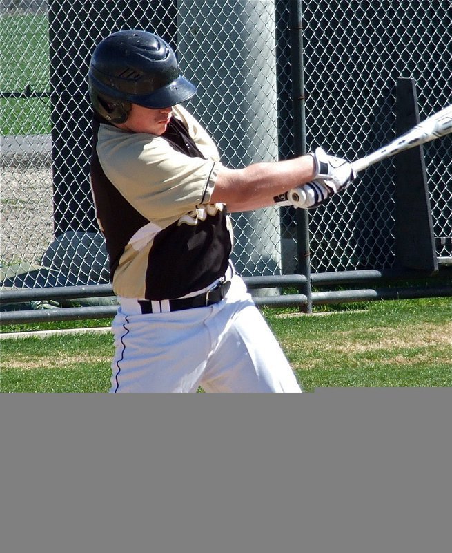 Image: Italy’s Kyle Fortenberry blasts a fly ball into left field.