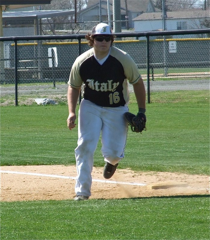 Image: Kevin “Big Agua” Roldan(16) hustles in from first base to make a play.